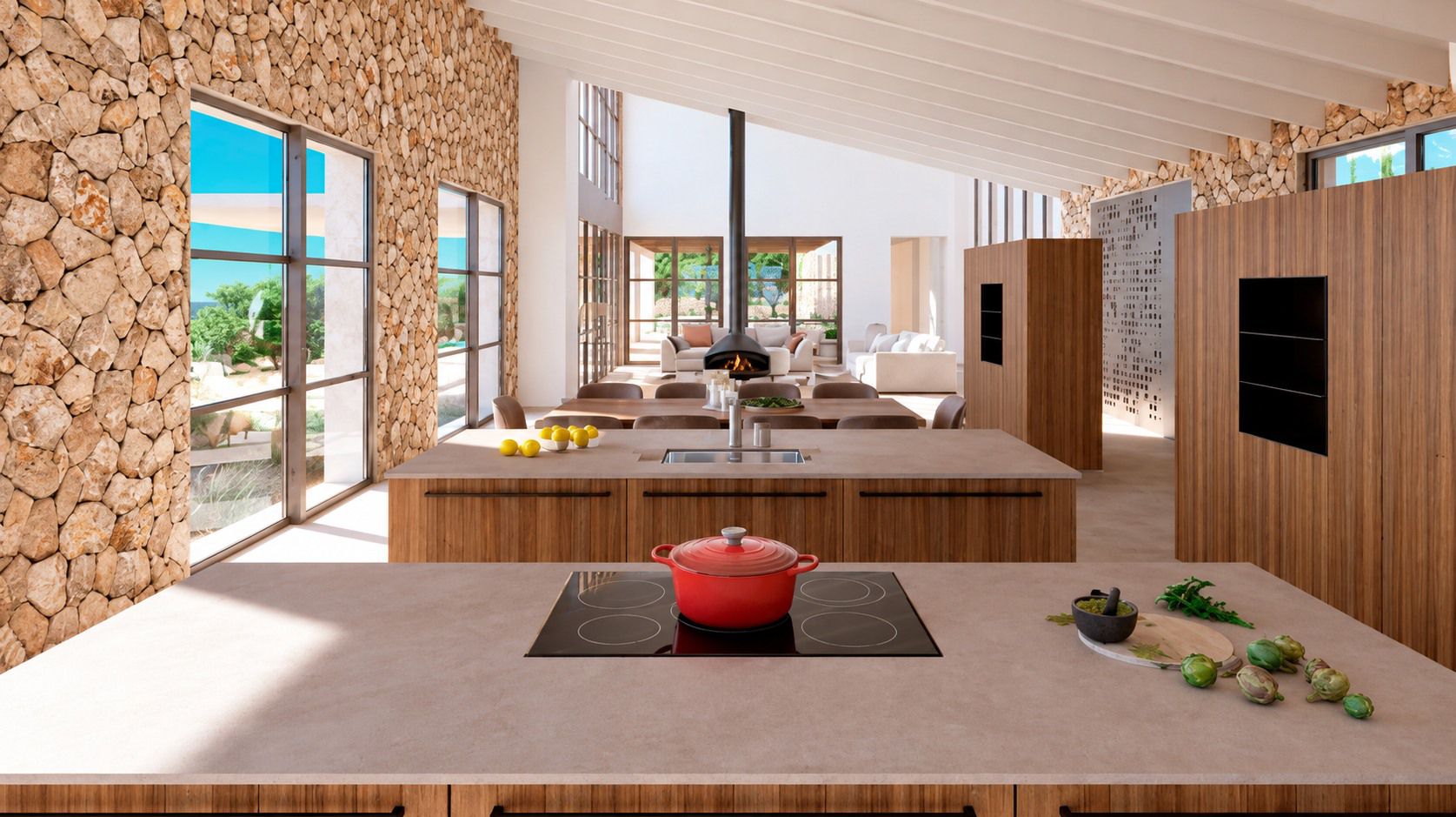 Inspiración de interiores: cocina abierta con isla, muebles de madera, muro de piedra y techo de vigas
